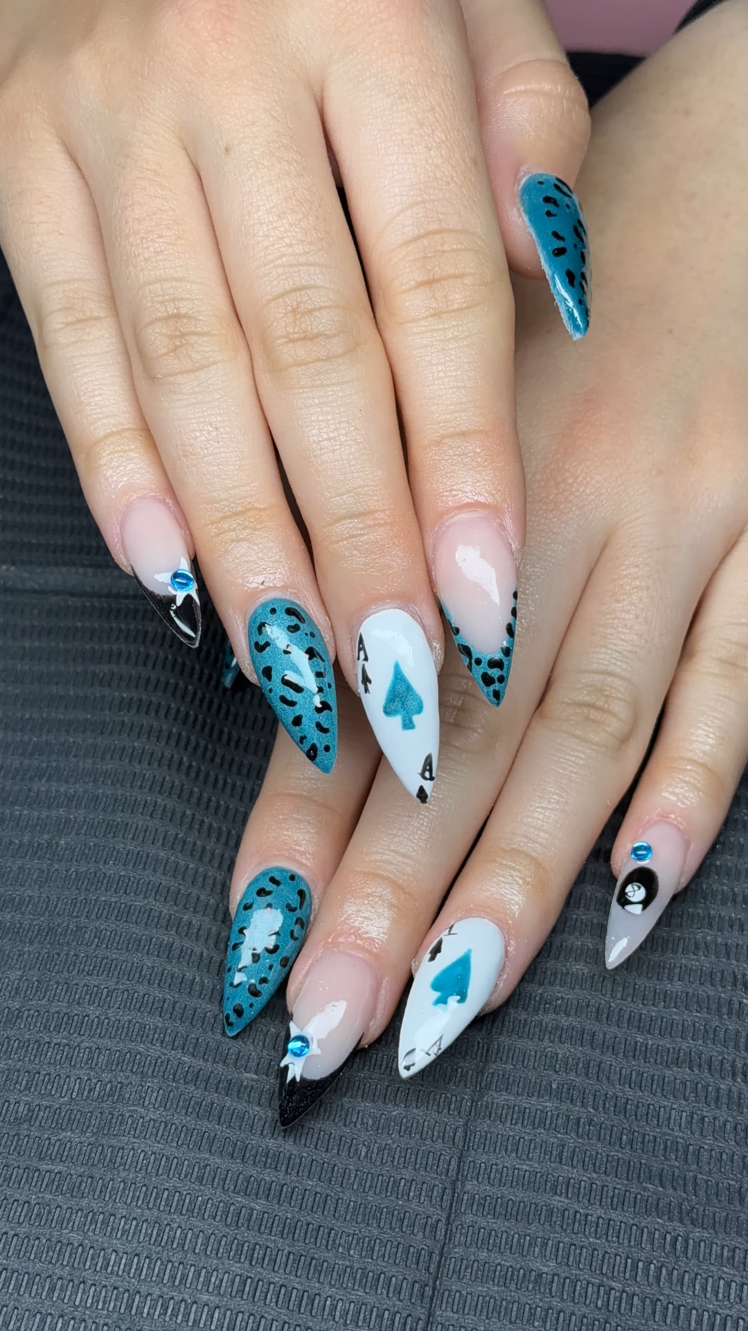 Turquoise playing-card nail art by Serin
