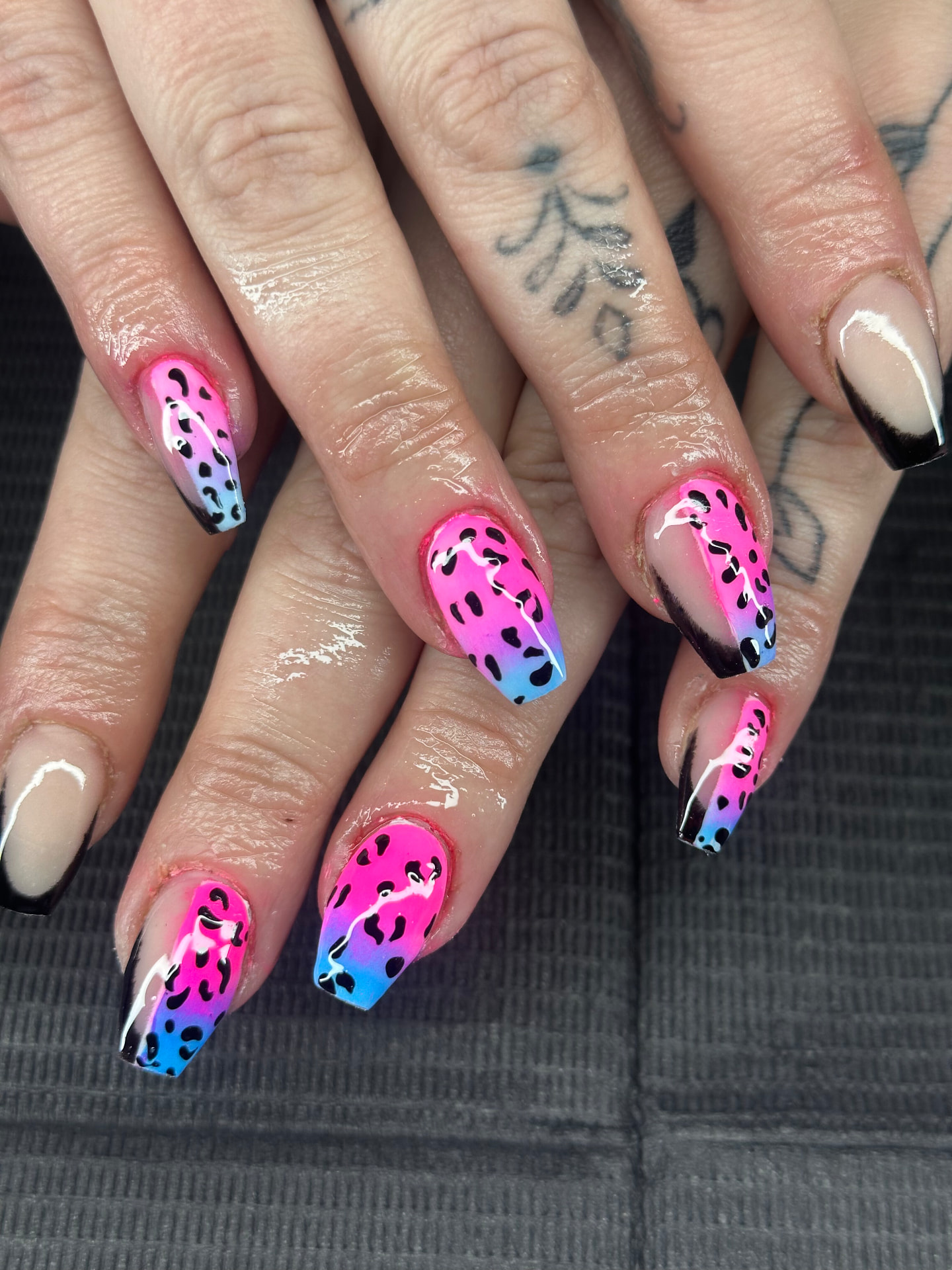 Pink and blue leopard nail art by Serin