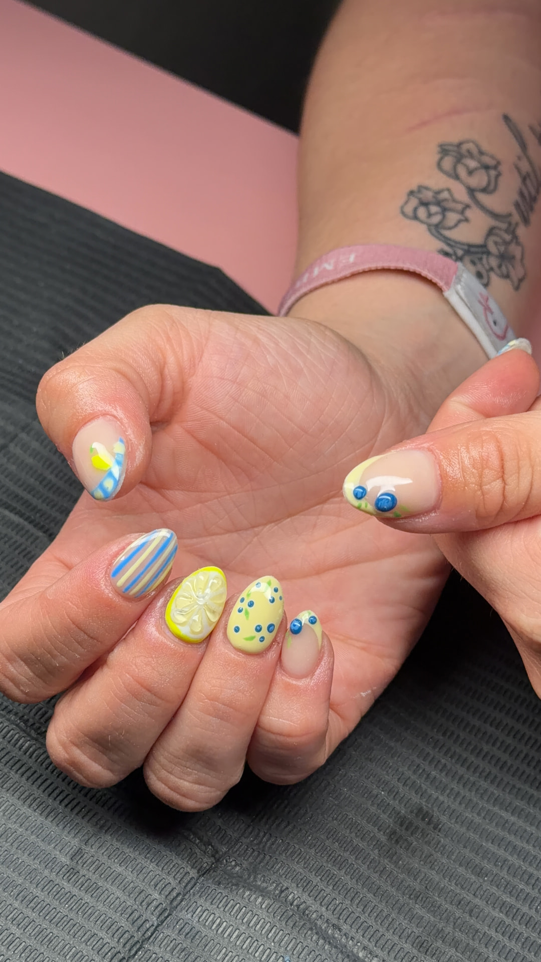 Lemon and blueberry nail art by Serin
