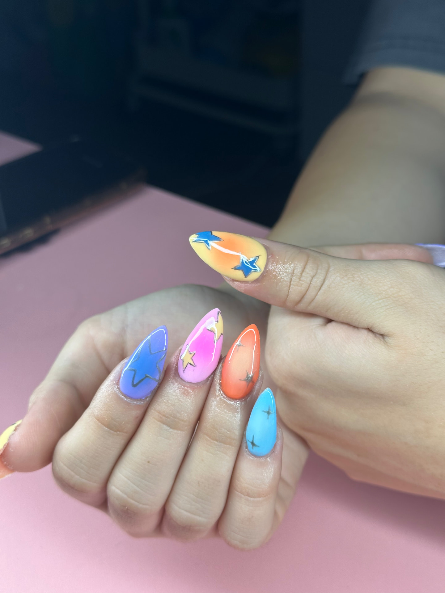 Colorful star nail art by Serin