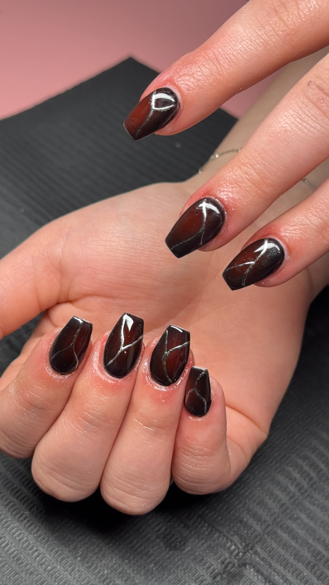 Glossy burgundy geometric nail art by Serin
