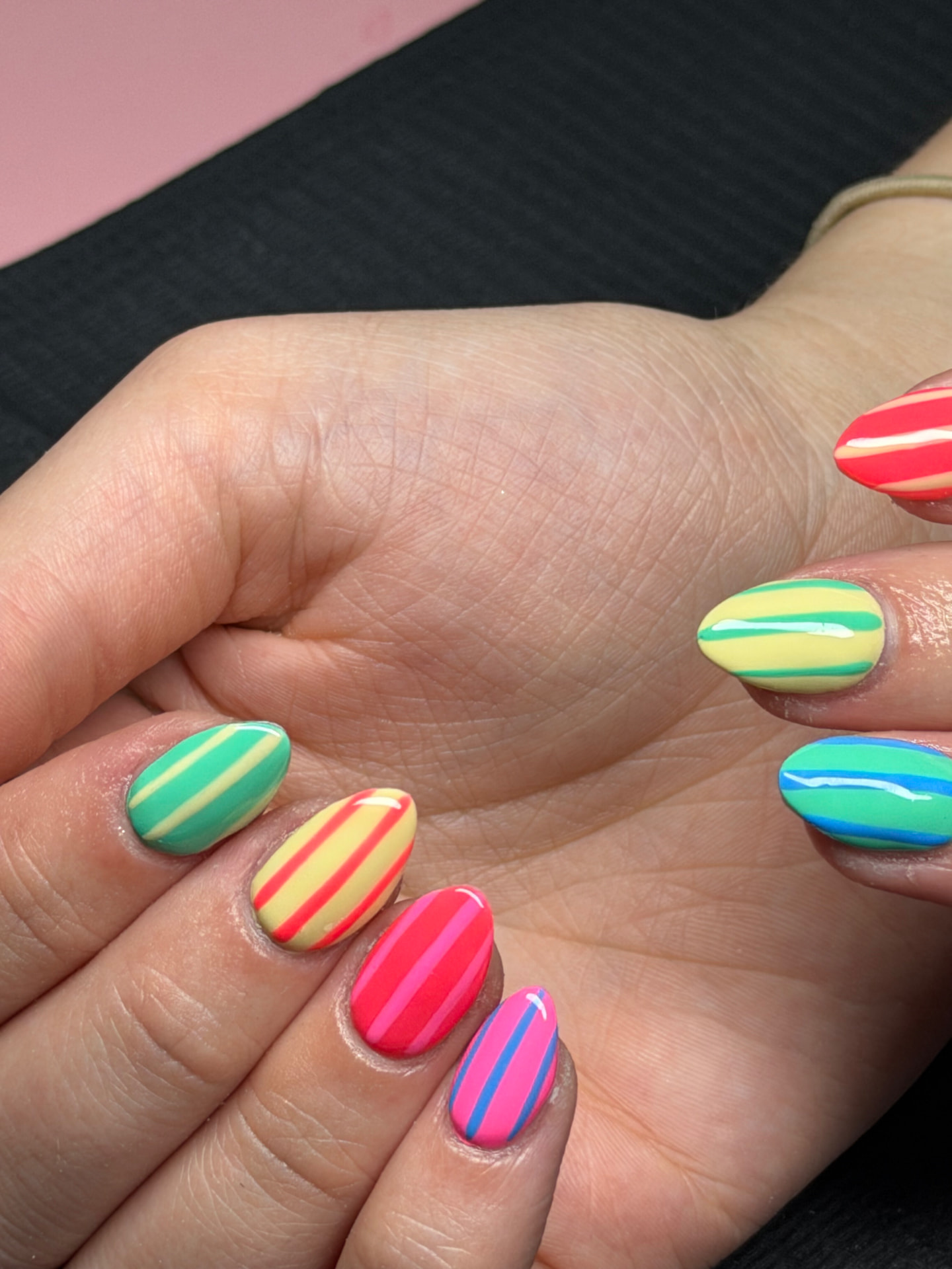 Colorful candy-stripe nail art by Serin