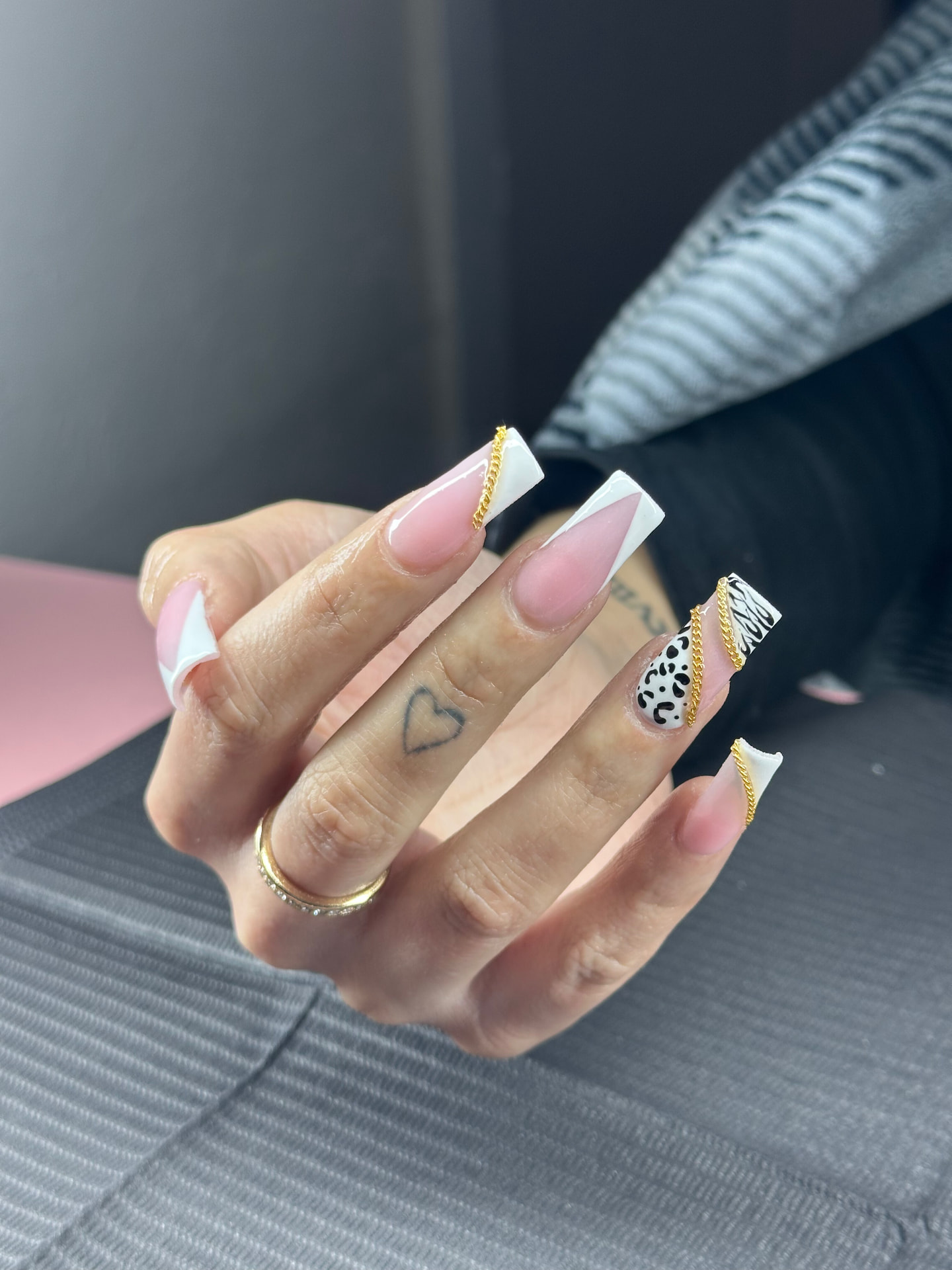 White French tips with gold accents by Serin