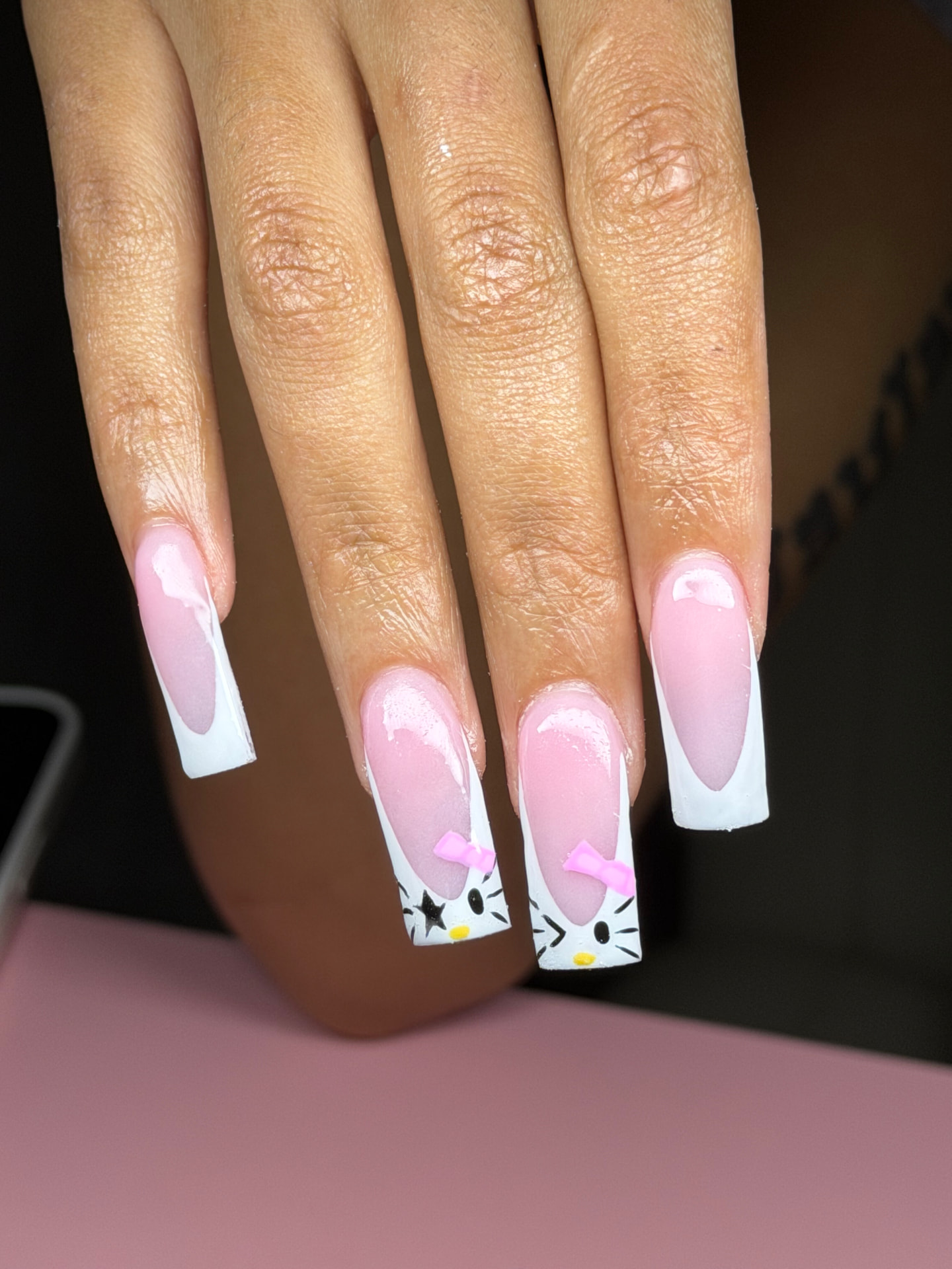 White French tips with pink bows by Serin