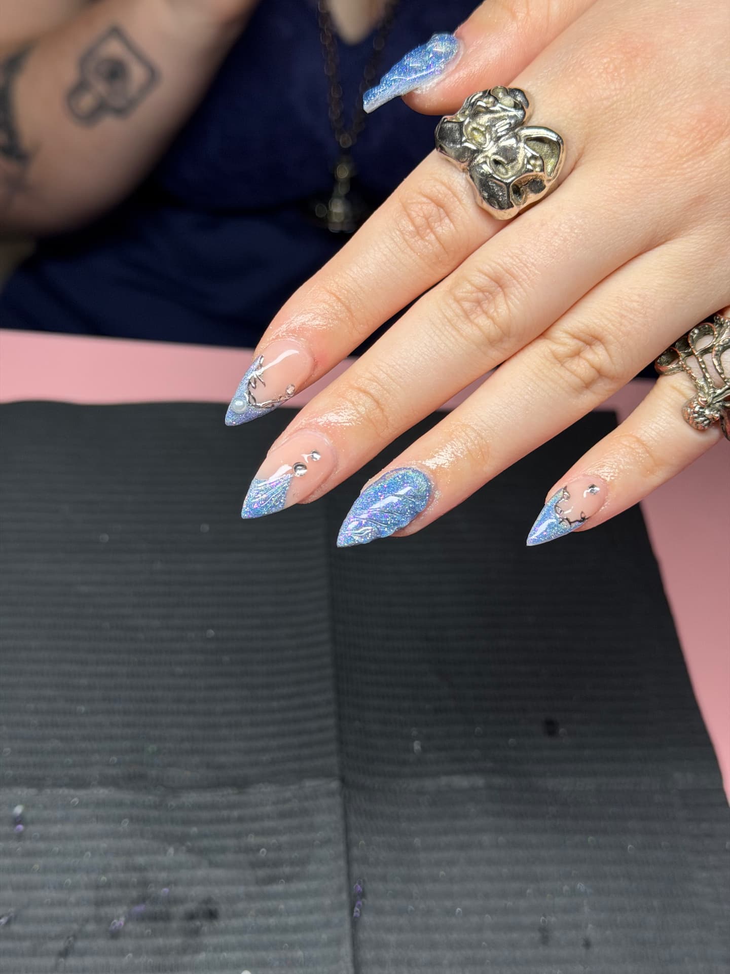 Blue glitter and silver nail art by Serin